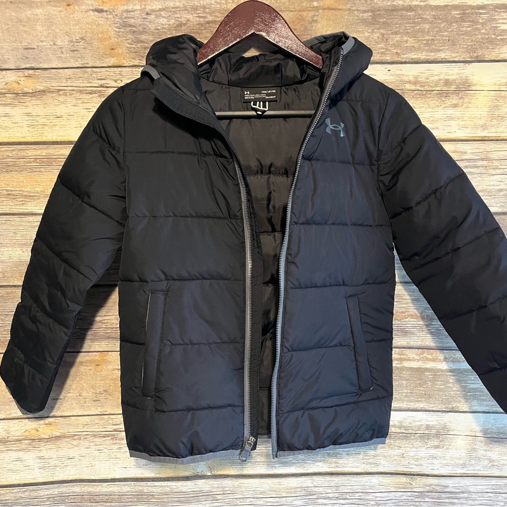 Kids Under Armour puffer jacket with hood.